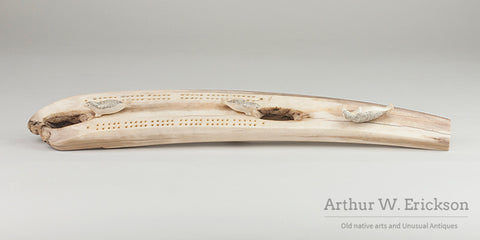 Inuit Carved Fossilized Ivory Cribbage Board with Scrimshawed Ivory Seals