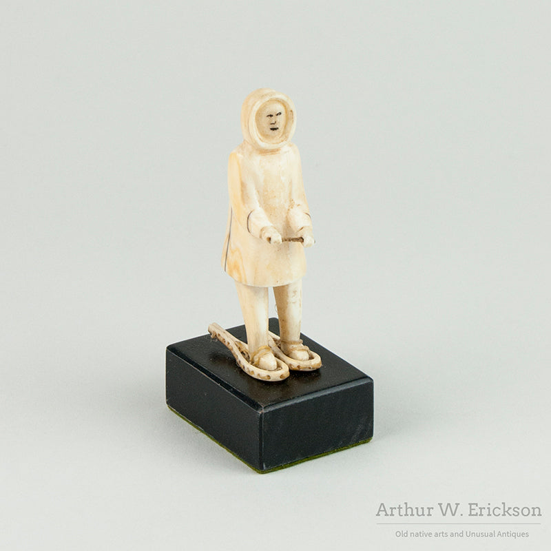 Inuit Ivory Carving of Man on Snowshoes
