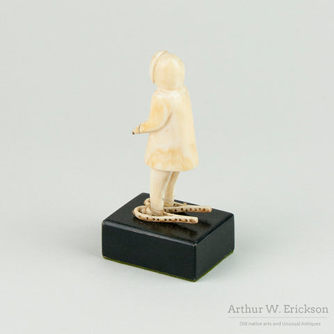 Inuit Ivory Carving of Man on Snowshoes