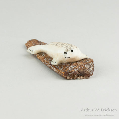 Eskimo Carved Seal on Fossilized Walrus Ivory Base