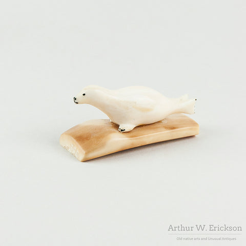 Eskimo Carved Seal on Fossilized Walrus Ivory Base