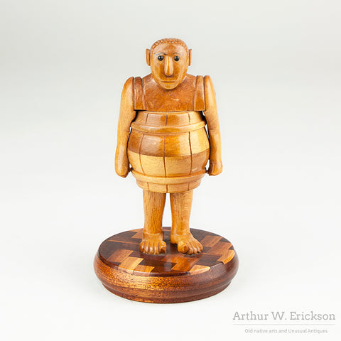 Folk Art Man In A Barrel by Howard Ortman