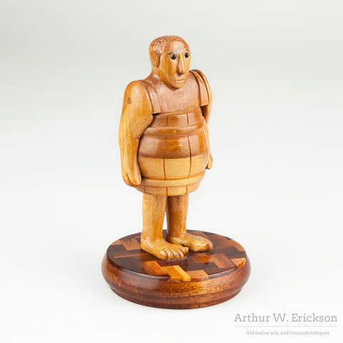 Folk Art Man In A Barrel by Howard Ortman