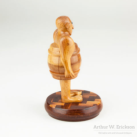 Folk Art Man In A Barrel by Howard Ortman