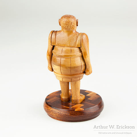 Folk Art Man In A Barrel by Howard Ortman