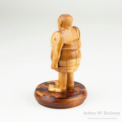 Folk Art Man In A Barrel by Howard Ortman