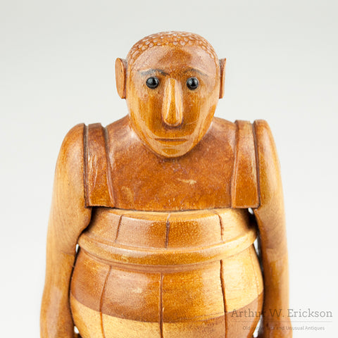 Folk Art Man In A Barrel by Howard Ortman