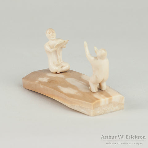 Carved Ivory Portrayal of Inuit Drummer and Dancing Figure