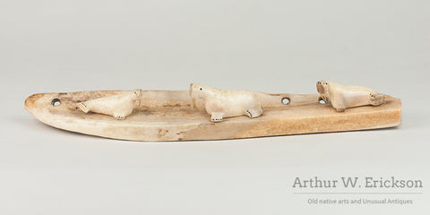 Three Inuit Carved Walruses on a Fossilized Ivory Sled Runner