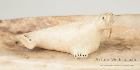 Three Inuit Carved Walruses on a Fossilized Ivory Sled Runner