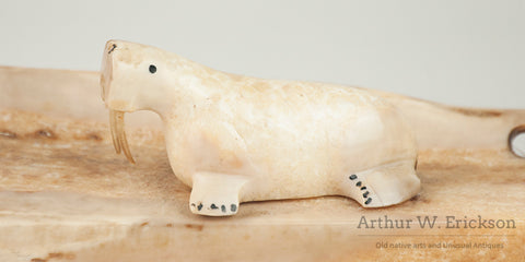 Three Inuit Carved Walruses on a Fossilized Ivory Sled Runner