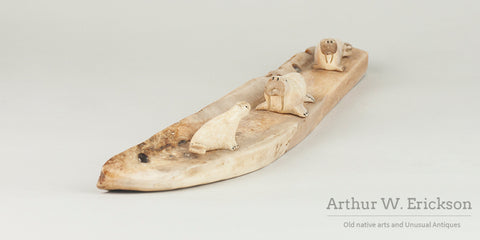 Three Inuit Carved Walruses on a Fossilized Ivory Sled Runner
