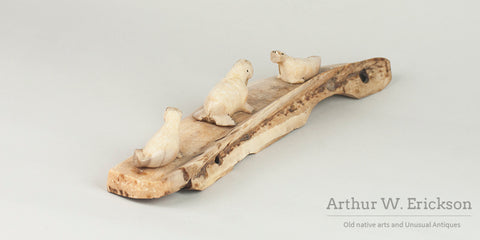 Three Inuit Carved Walruses on a Fossilized Ivory Sled Runner