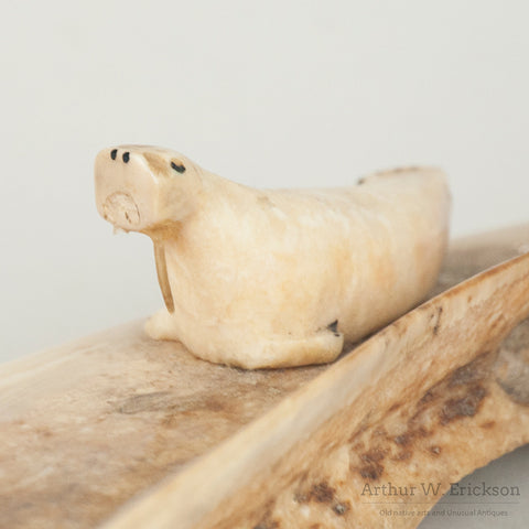 Three Inuit Carved Walruses on a Fossilized Ivory Sled Runner
