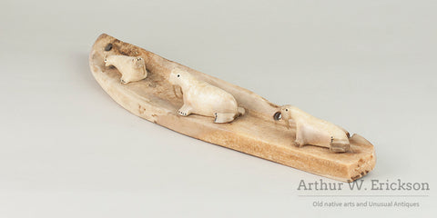 Three Inuit Carved Walruses on a Fossilized Ivory Sled Runner