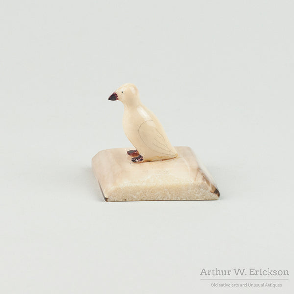 Carved Walrus Ivory Sitting Bird on Fossilized Ivory Mount