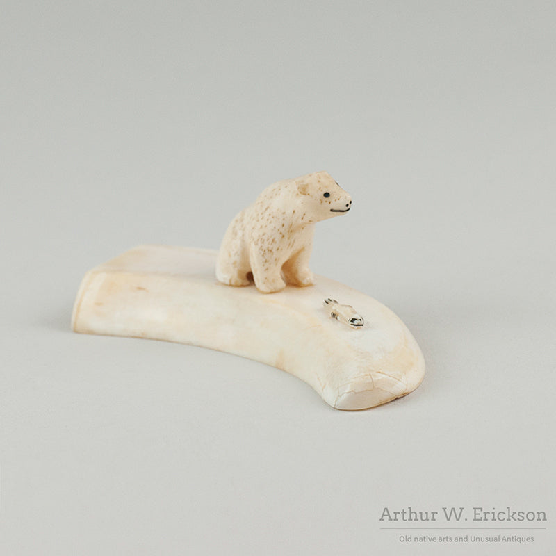 Inuit ivory Carving of a Sitting Bear Before Tiny Seal on Ivory Base