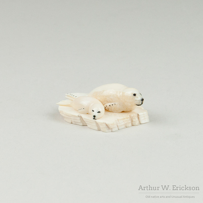 Bryan Kulik Inuit Ivory Carving of Two Seals on a Mount
