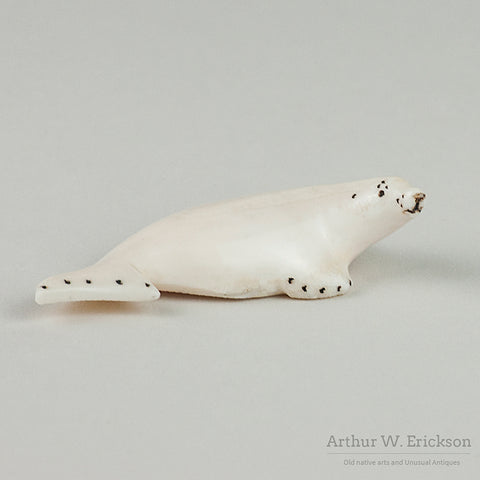 Inuit Carved Walrus Ivory Seal by Tupkok