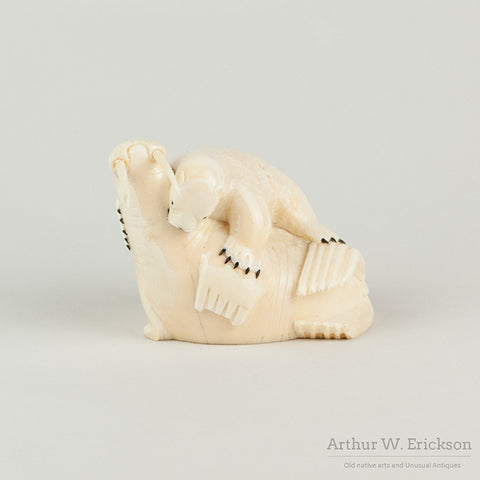 Inuit Walrus Ivory Carving of a Polar Bear Attacking a Walrus