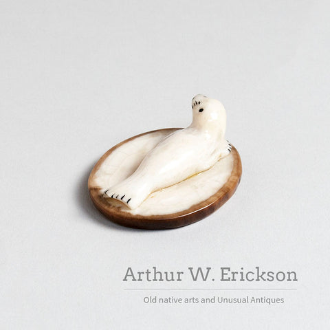 Small Walrus Ivory Resting Seal on a Mount of Fossilized Walrus Ivory