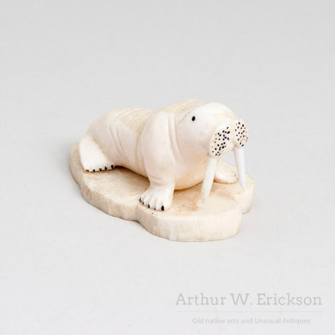 Inuit Carved Ivory Walrus with Large Tusks on a Mount