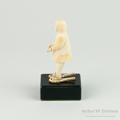 Inuit Ivory Carving of Man on Snowshoes