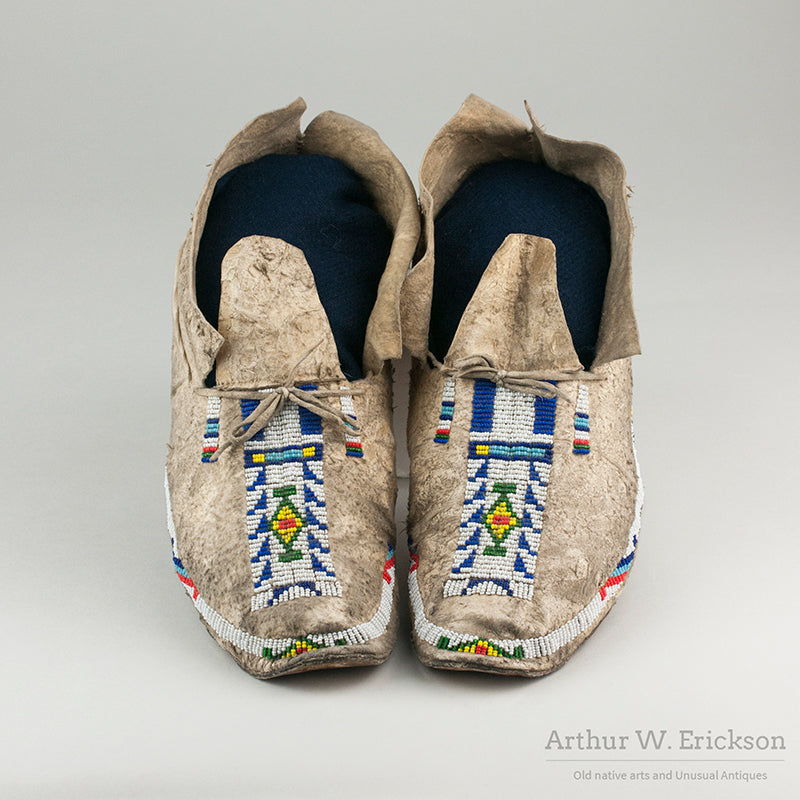 Pair of Arapaho Partially Beaded Moccasins