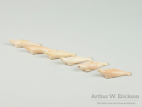 Six Inuit Ivory Seal Buttons