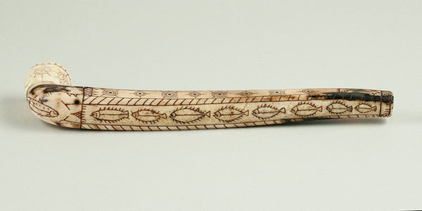Heavily Scrimshawed Early Eskimo Ivory Pipe.