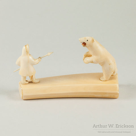 Ivory Stand-off Between Polar Bear and Eskimo Hunter