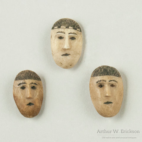 Three Eskimo Carved Face Buttons